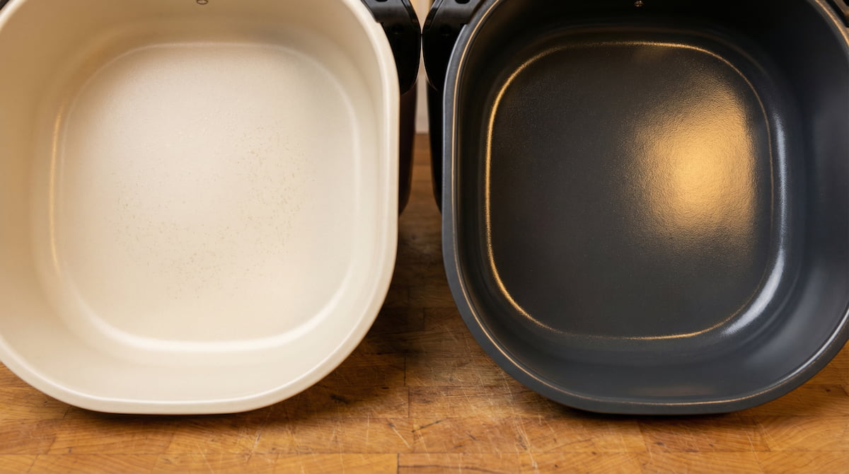 macro closeup of ceramic coated basket versus dark PTFE nonstick air fryer basket texture