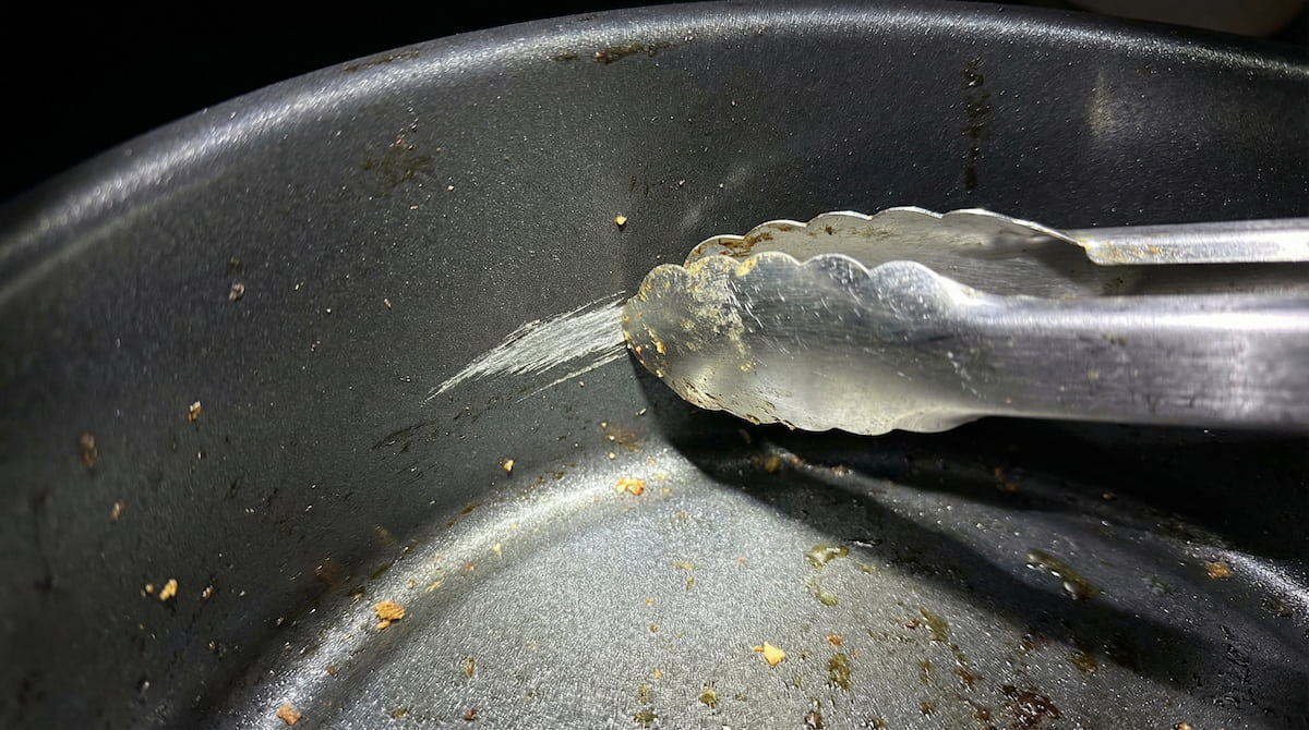 metal tongs scratching non-stick coating inside air fryer basket