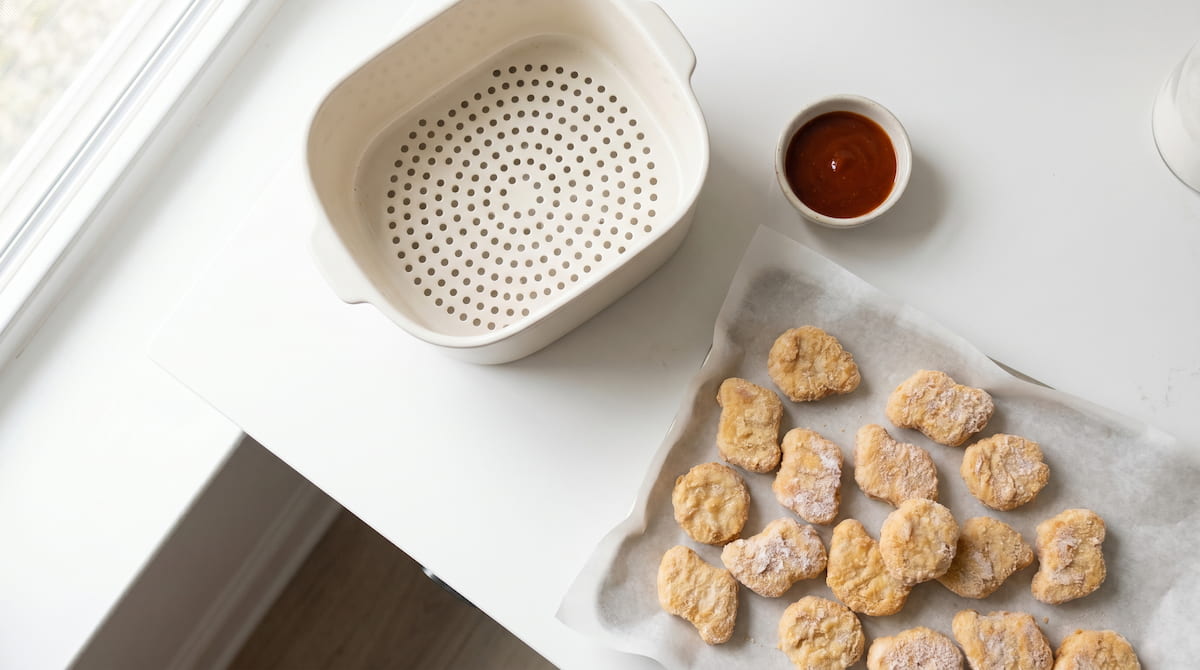 frozen chicken nuggets air fryer ceramic basket safe kids coating prep flatlay