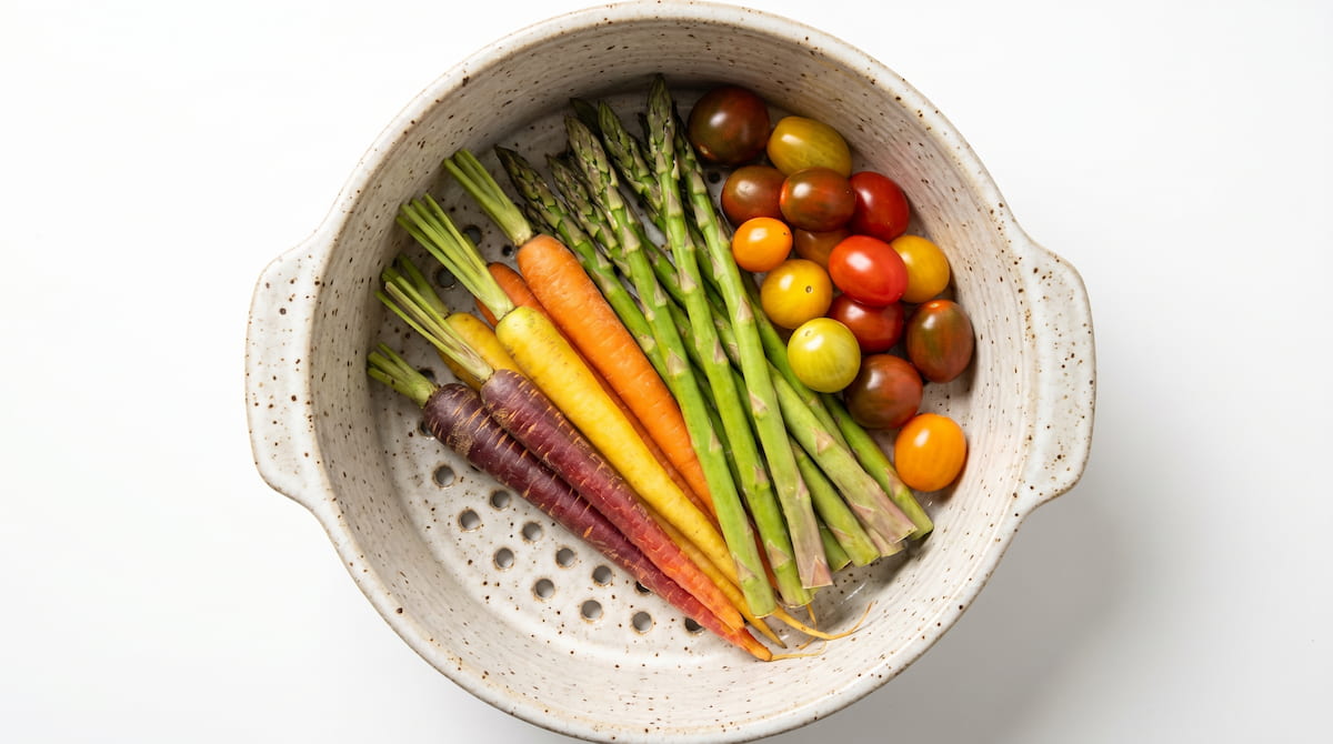 vegetables in ceramic air fryer basket cooked without oil