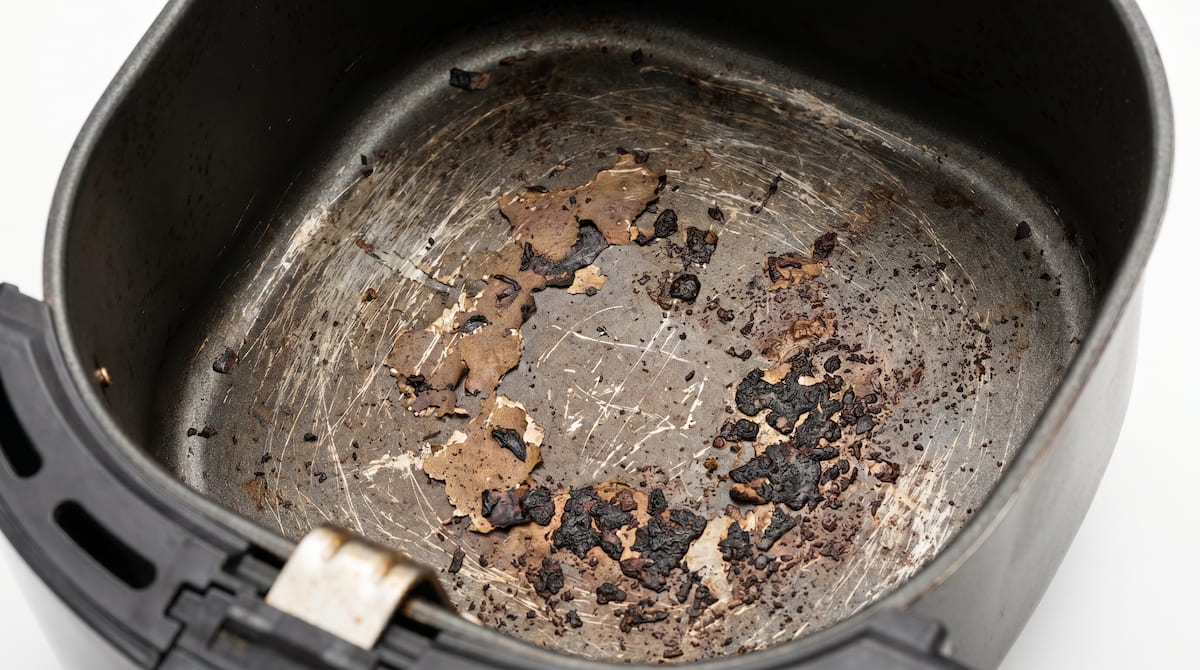 air fryer coating degradation causing burning plastic smell