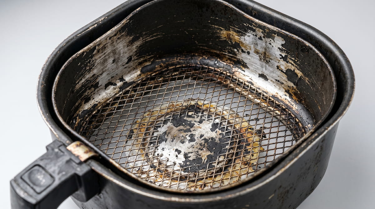 Worn scratched air fryer basket coating — signs that air fryer coating needs replacing
