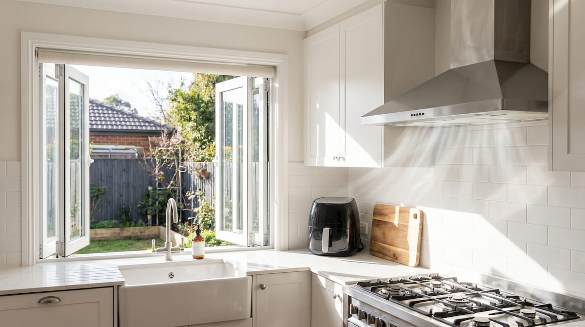 Kitchen range hood and open window — reducing toxic smoke from air fryer