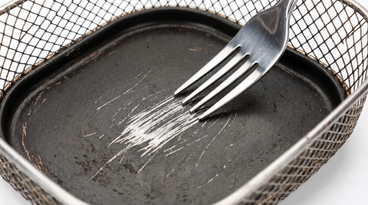metal utensil scratching air fryer basket coating dangerous mistake