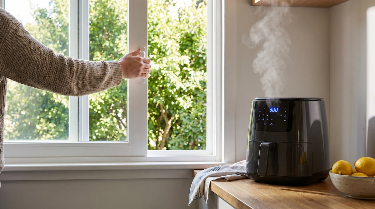opening kitchen window while air fryer cooks ventilation safety tip