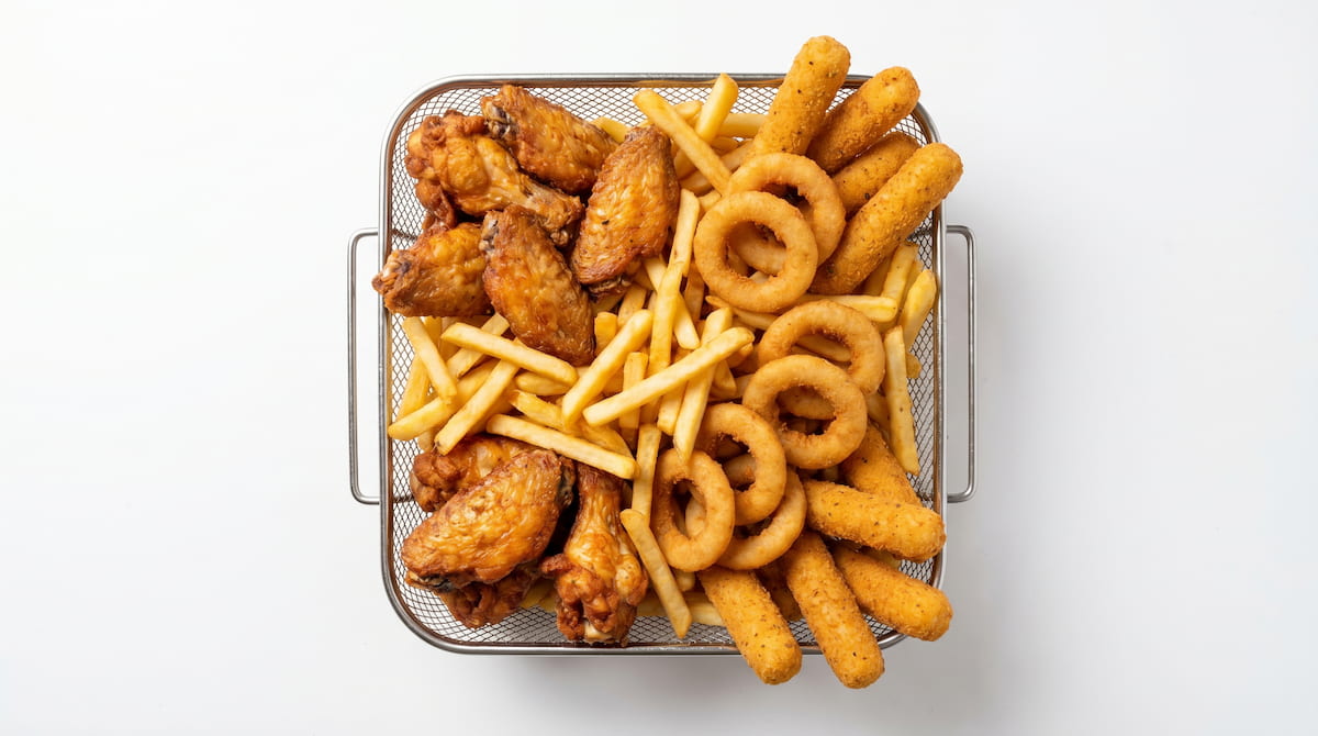 overcrowded air fryer basket causing uneven cooking and burning