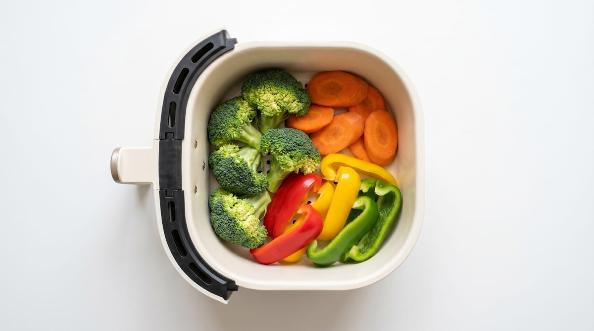 safe non-toxic ceramic air fryer basket with fresh vegetables