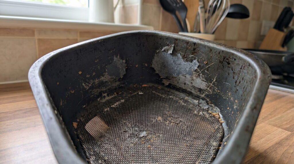Peeling nonstick coating inside a worn air fryer basket